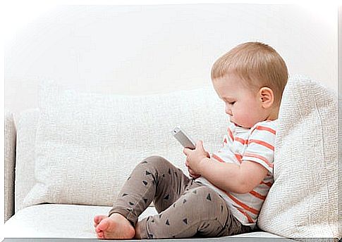 Baby using cell phone, smartphones must be banned for children