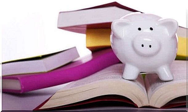 Piggy bank and books.