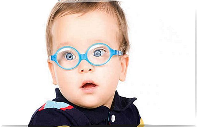 Eye problems: a baby with glasses.