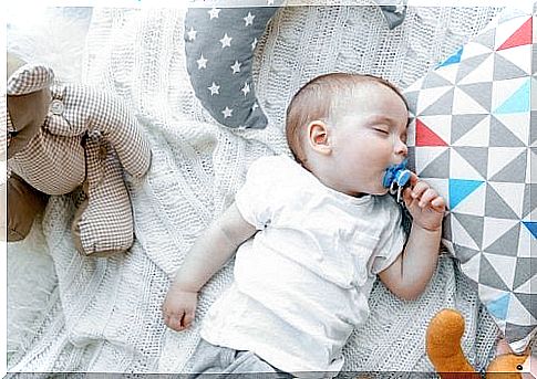 baby sleeping with pacifier