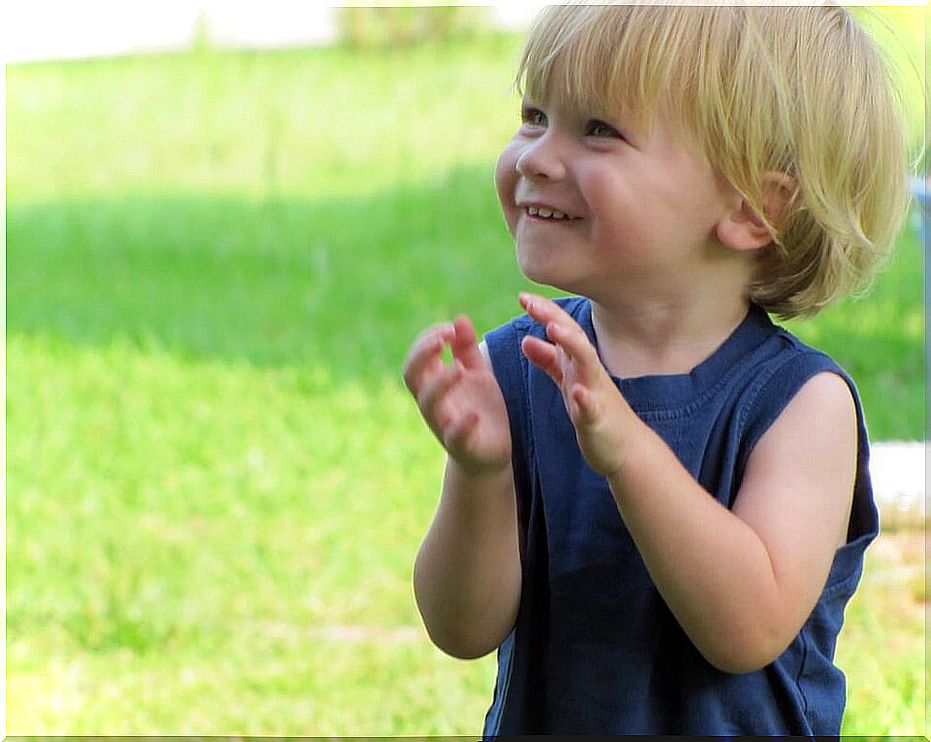 happy boy clapping 