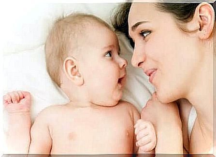 Mother and baby looking at each other: infant attachment